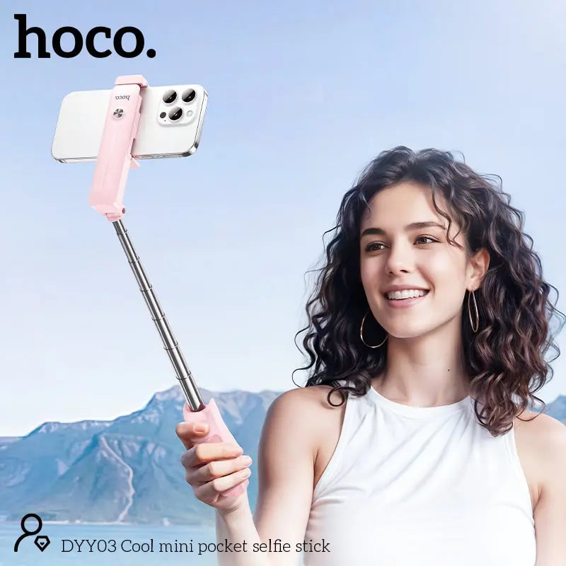 Portable telescopic selfie stick with 360 degree rotation
