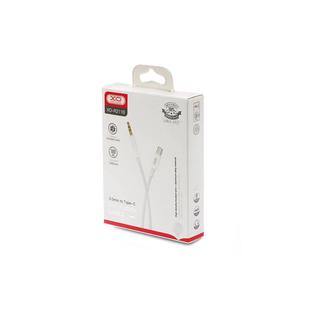 XO USB-C to 3.5mm audio cable plugged into car AUX