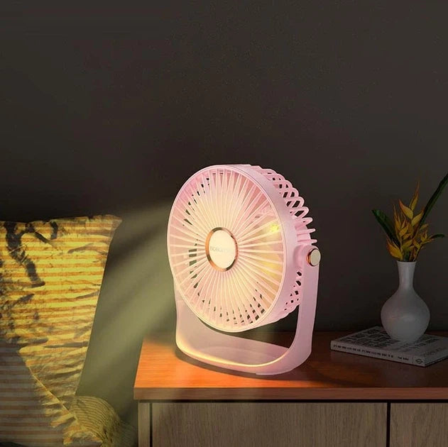 Compact desk fan with adjustable angle and LED illumination
