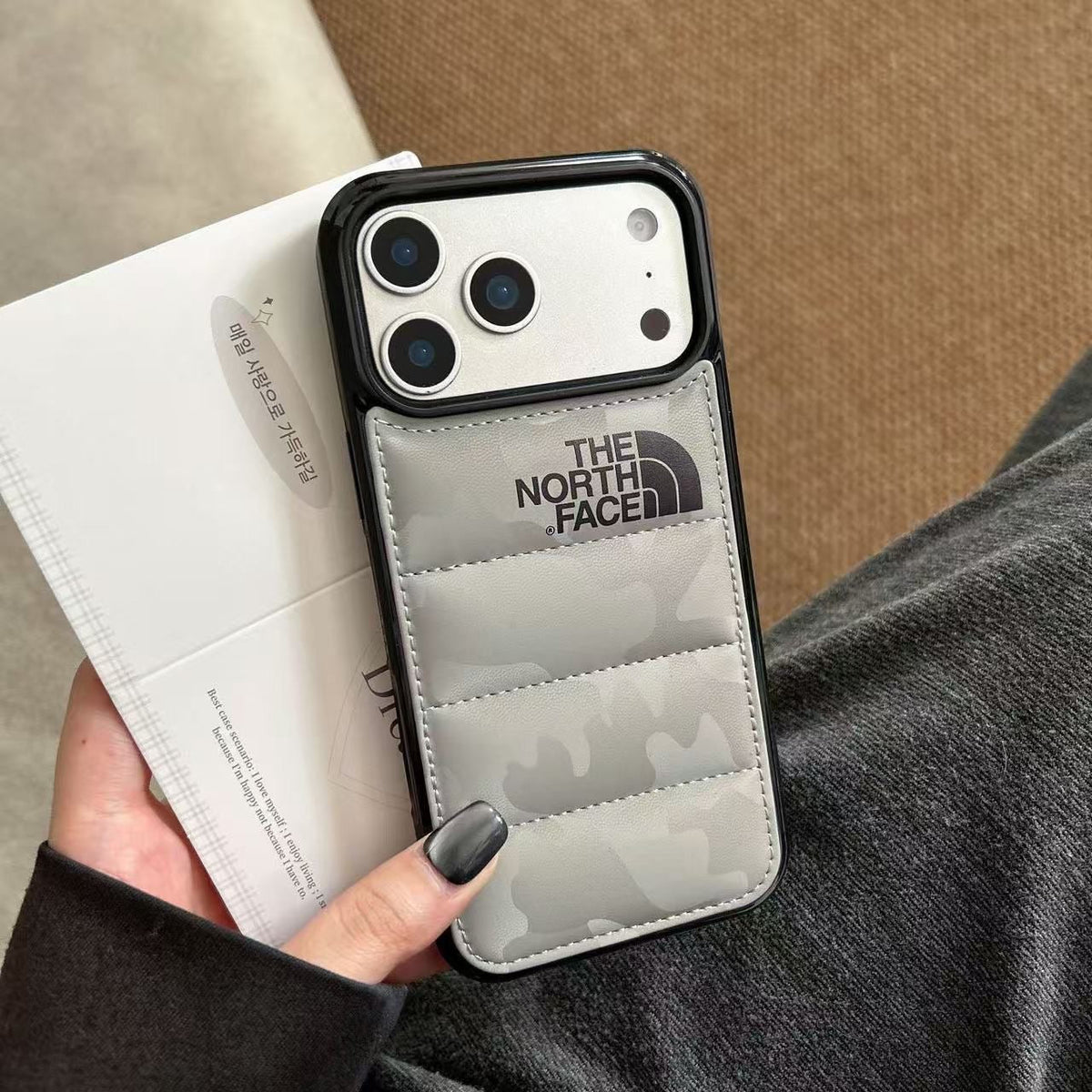 North Face puffer case quilted texture close-up iPhone 17 Pro Max