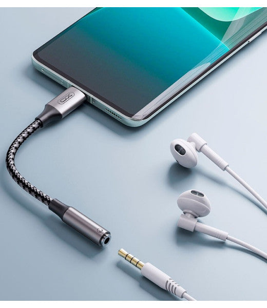XO NB-R257C USB-C AUX cable plugged into car stereo