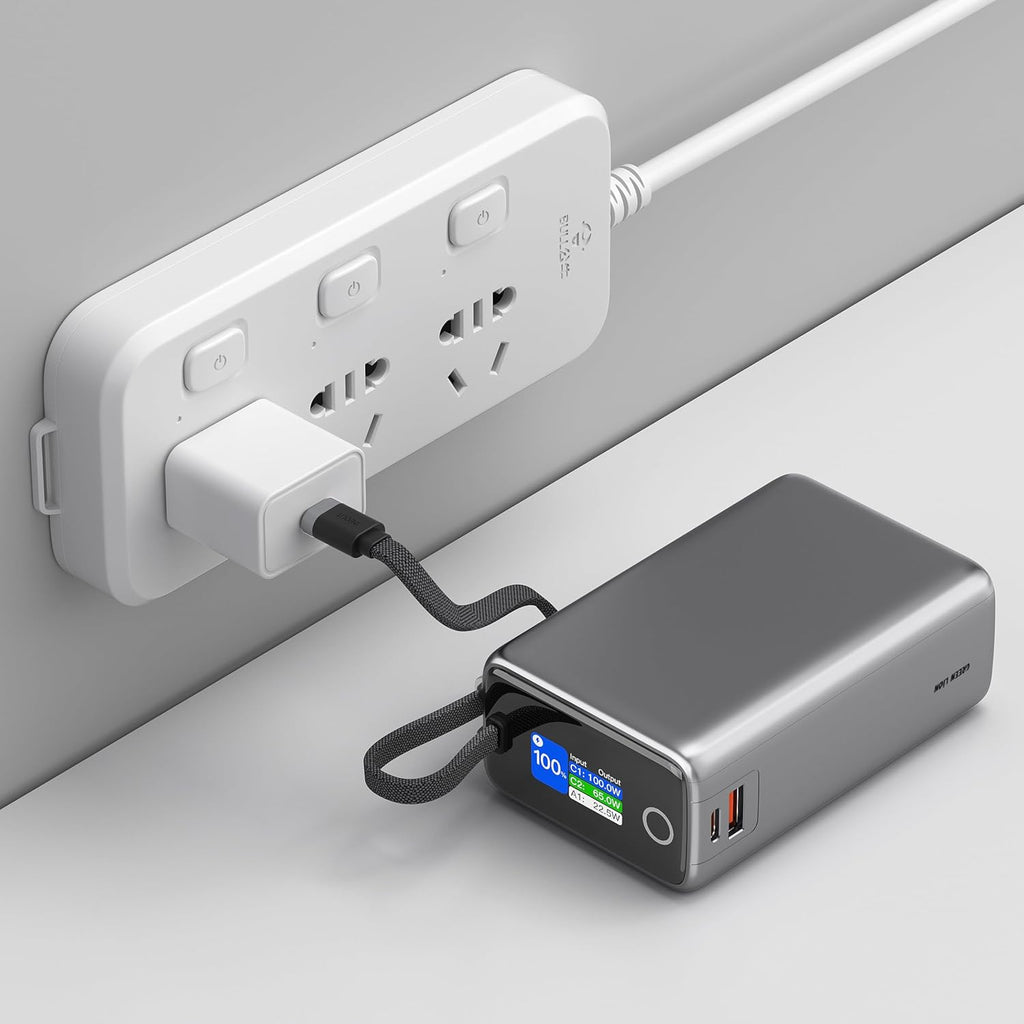 Green Lion Tron X power bank charging laptop via USB-C cable.
