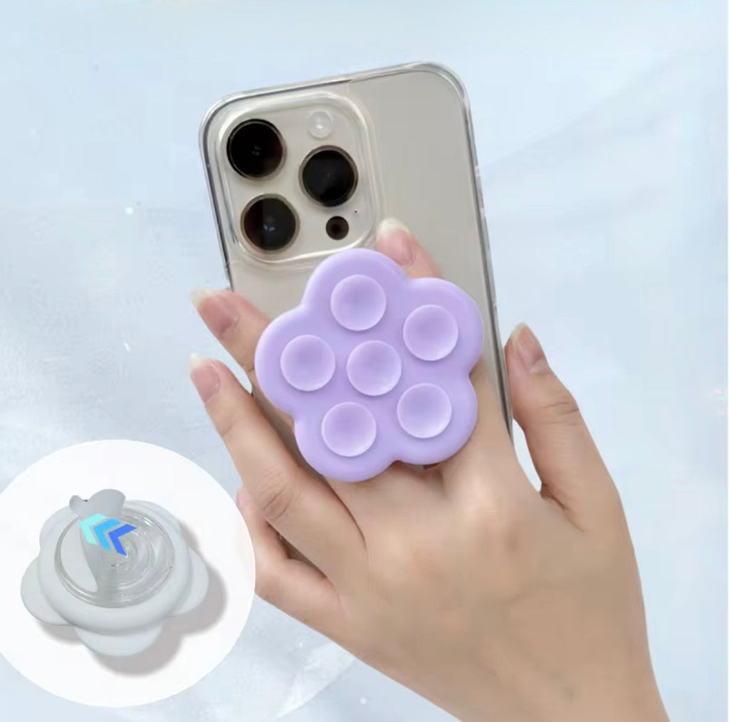 Flower phone grip extended as stand hands-free viewing
