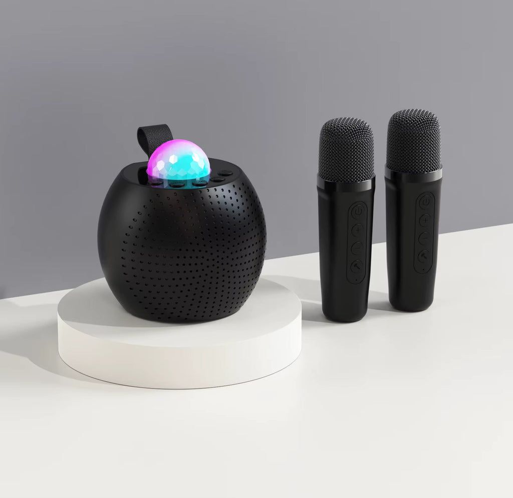 Mini karaoke speaker with dual wireless mics and LED lights front view