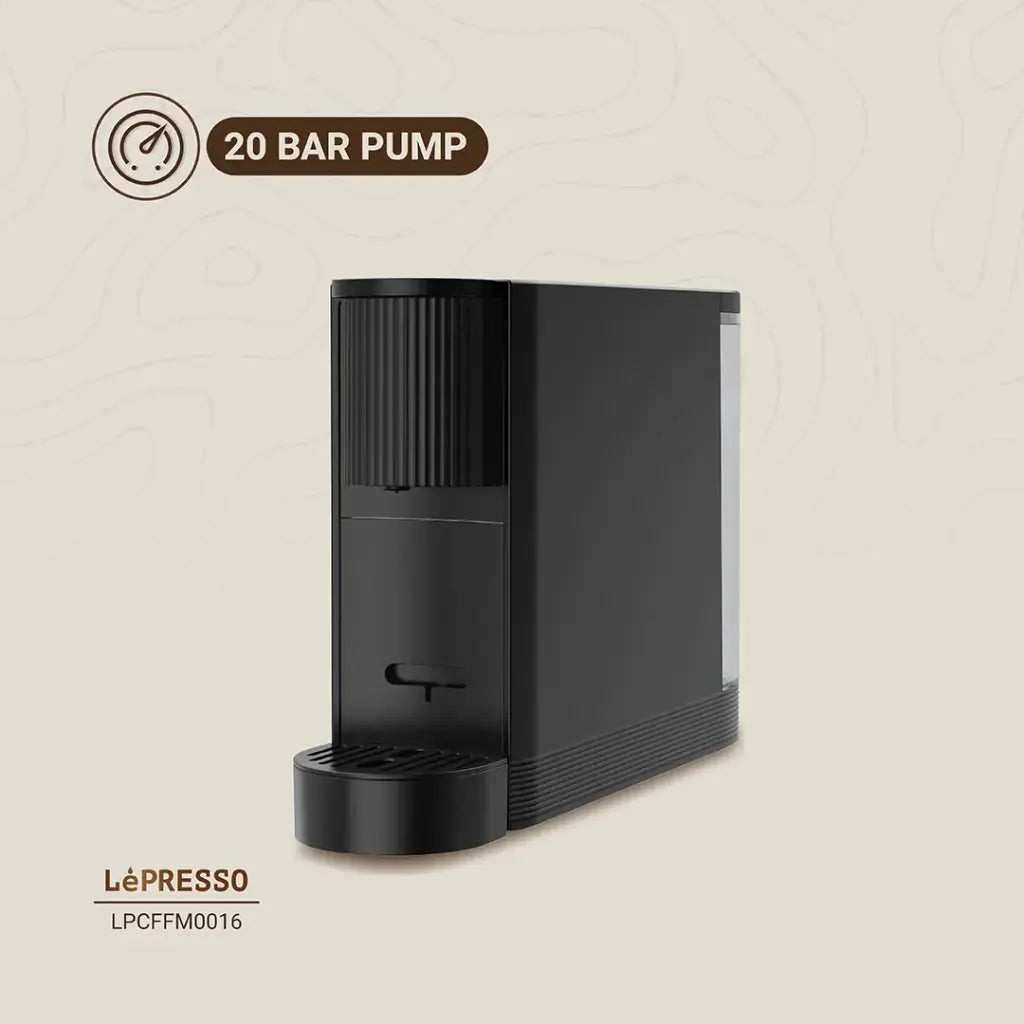LePresso automatic coffee maker with built-in capsule storage and sleek minimalist black design on kitchen counter
