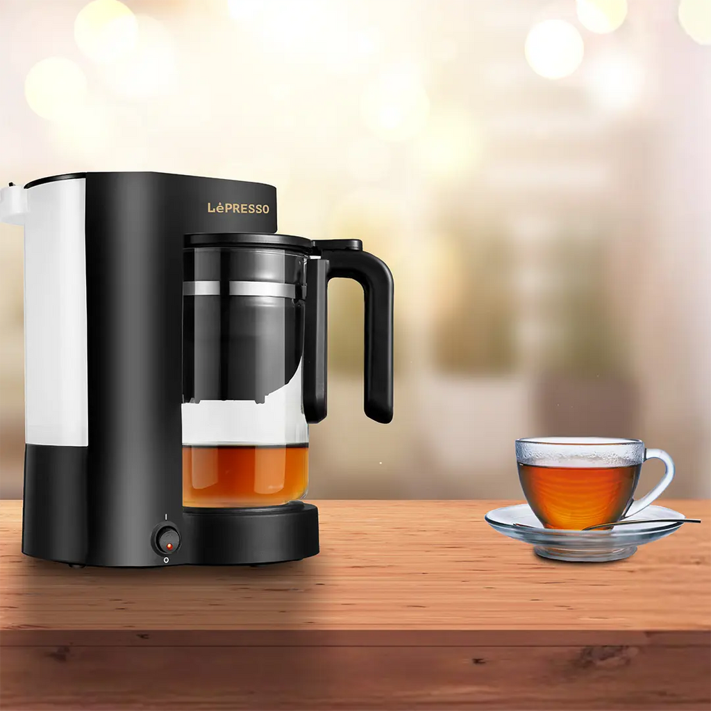 LePresso LPCFFM0021 dual brew machine brewing coffee through permanent reusable filter into glass carafe
