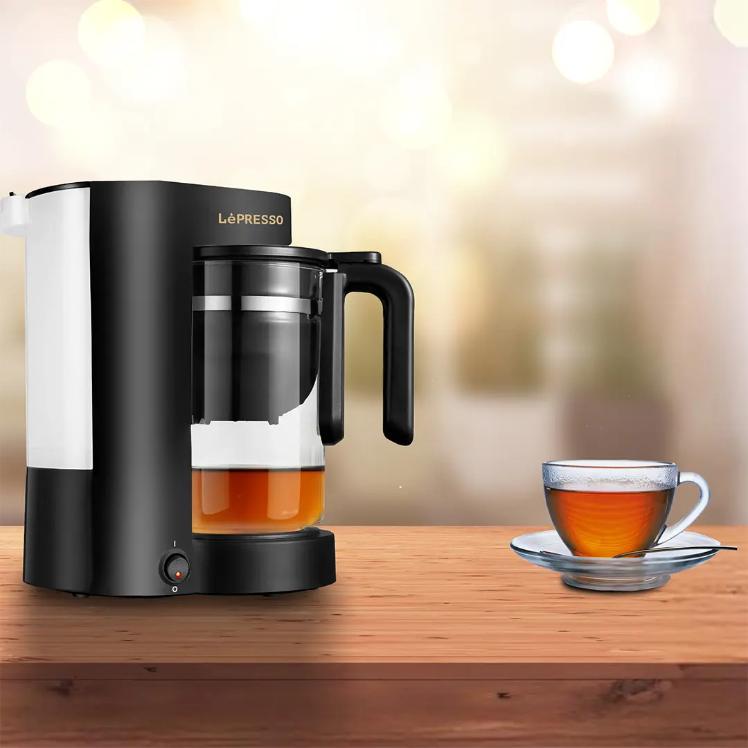 LePresso LPCFFM0021 dual brew machine brewing coffee through permanent reusable filter into glass carafe
