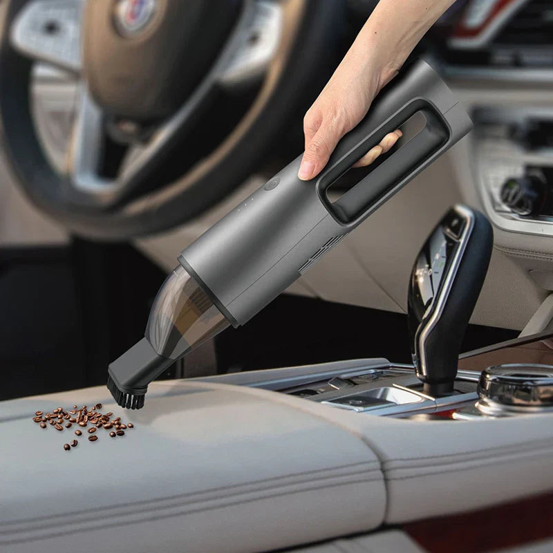 XO CZ019 cordless handheld vacuum in use cleaning keyboard