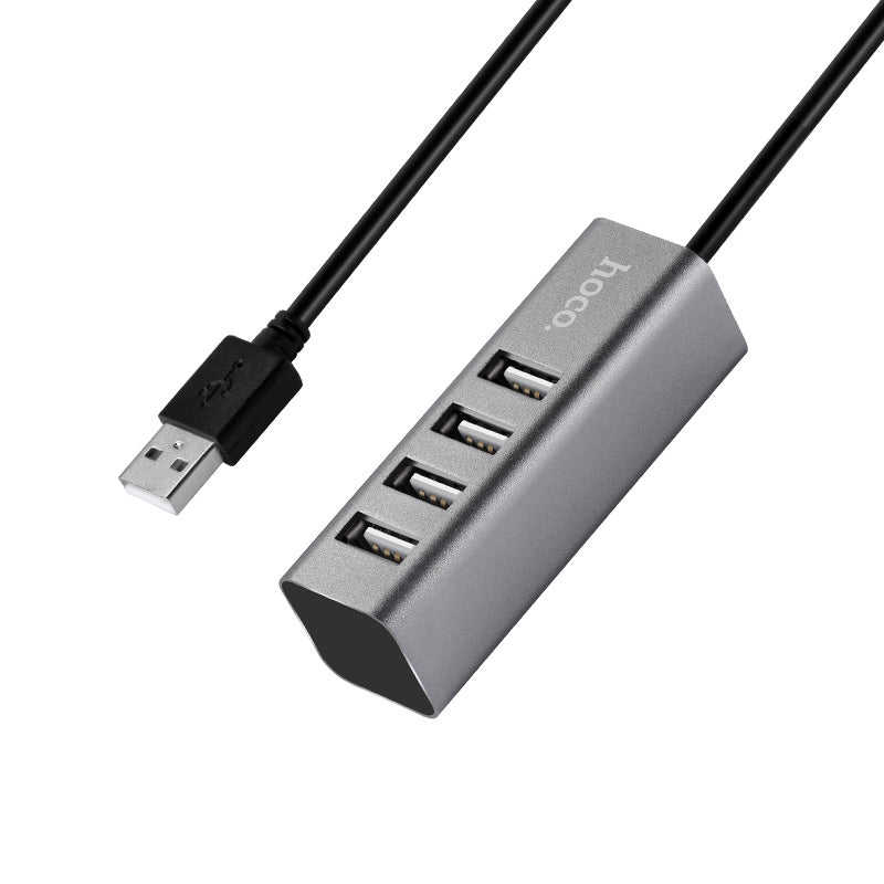 HOCO HB1 USB hub with 4 USB ports connected to laptop
