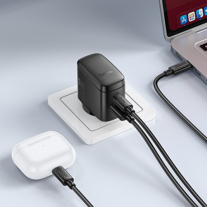 HOCO CS63A Wall Charger PD65W plugged into power socket with EU cable.
