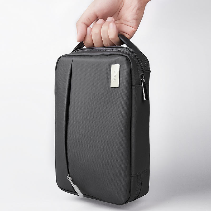 Compact tech organizer bag with multiple compartments
